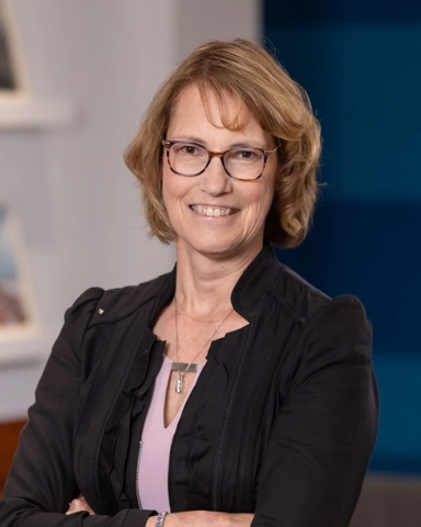 portrait of a smiling woman in business attire